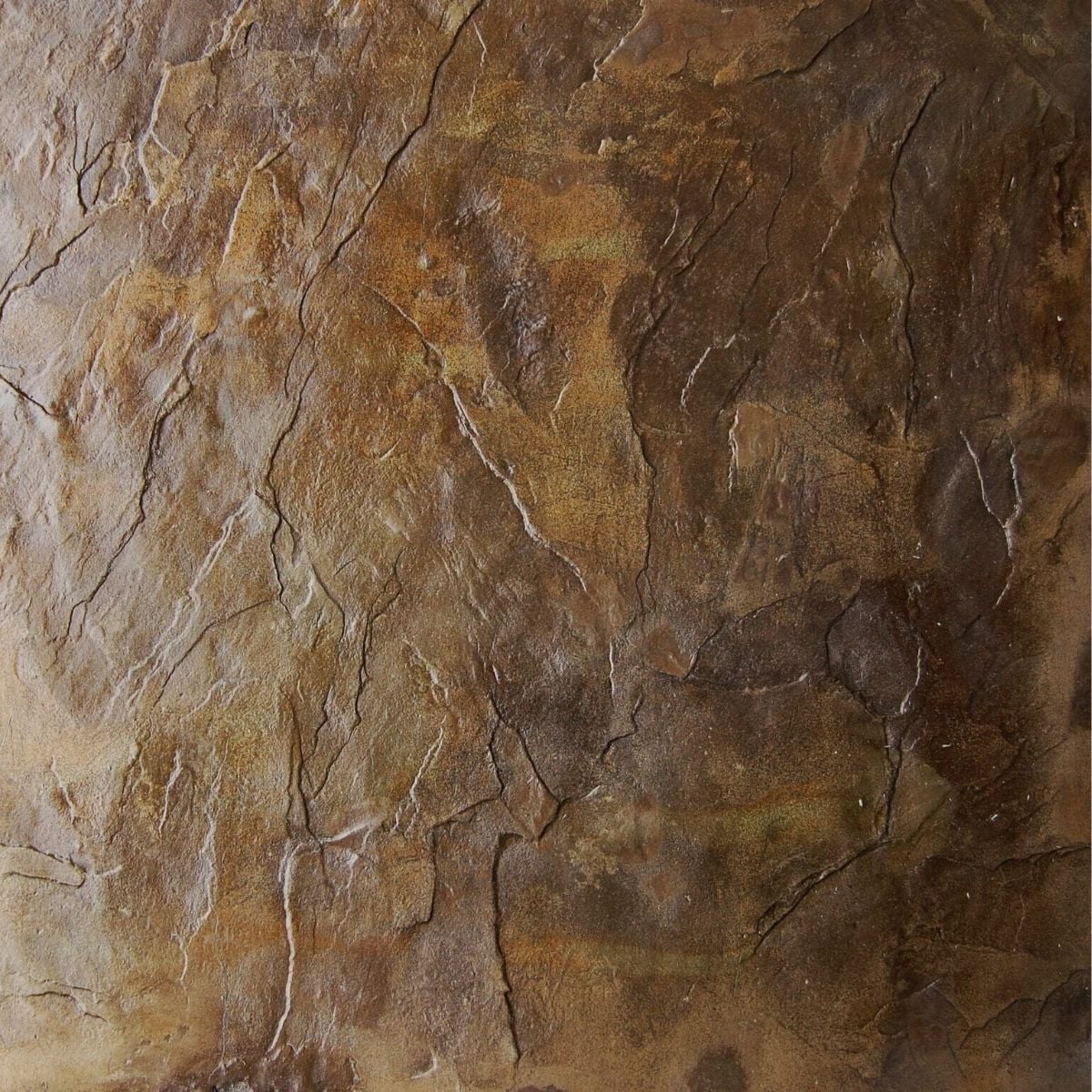Brown concrete stamped cleanly using colored release agents