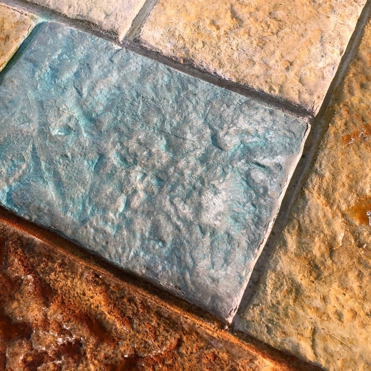 Colorful concrete stain used for natural and bright colored concrete