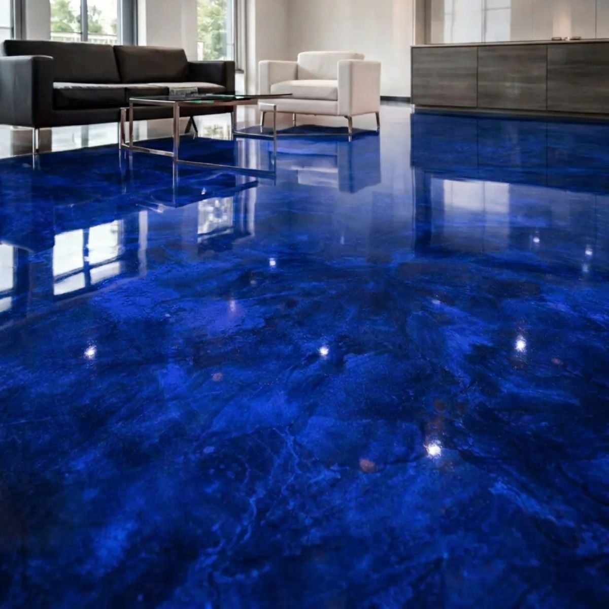 Royal Blue metallic epoxy flooring with deep sapphire blue swirling pigment and high gloss finish