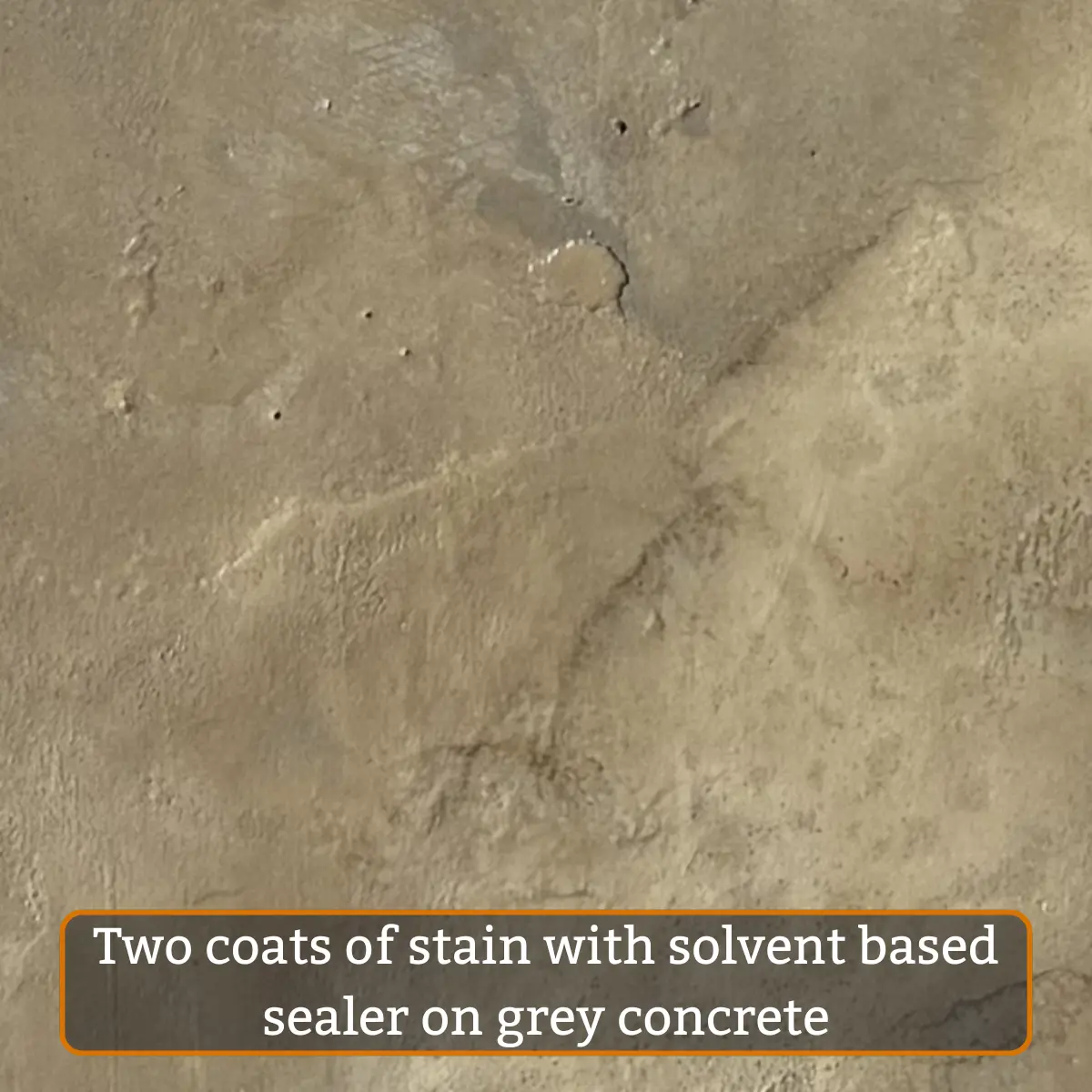 Champagne water-based concrete stain on grey concrete with sealer